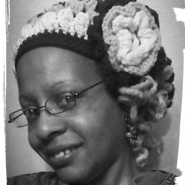 Crocheted Beret with Tri-layerd Floral Accent